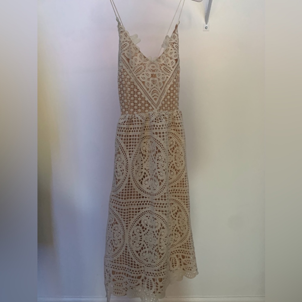 Women’s white lace cutout garden party dress